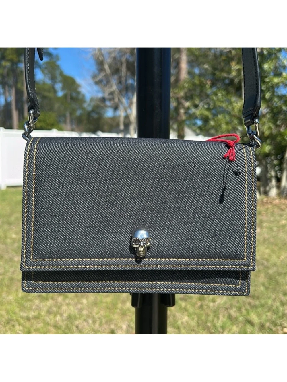 New pre-authenticated Alexander McQueen skull denim bag with dust bag